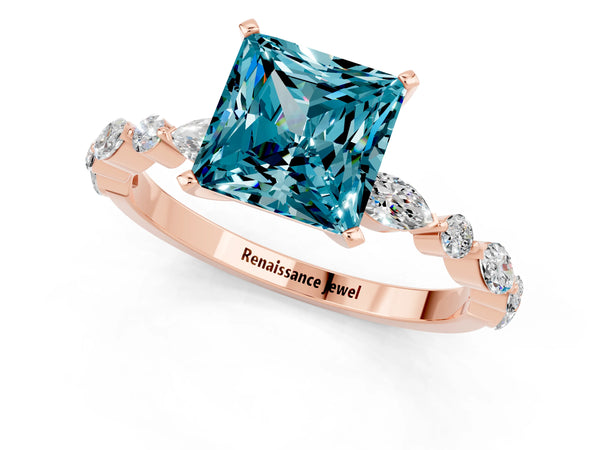 Rose gold Princess Cut Blue Topaz Ring with Marquise and Round  Side Stones and Four-Prong Setting