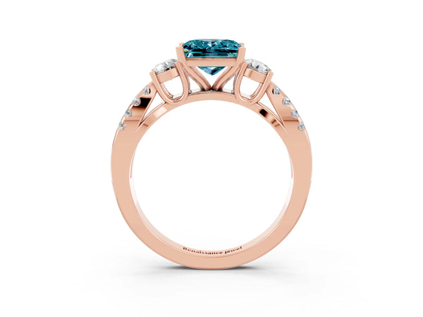 Rose gold Princess Cut Blue Topaz Three-Stone Ring with Pavé Split Shank and Four-Prong Setting