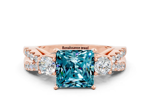 Rose gold Princess Cut Blue Topaz Three-Stone Ring with Pavé Split Shank and Four-Prong Setting