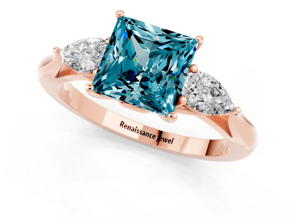 Rose gold Princess Cut Blue Topaz Three-Stone Ring with Pear  Side Stones and Prong Setting