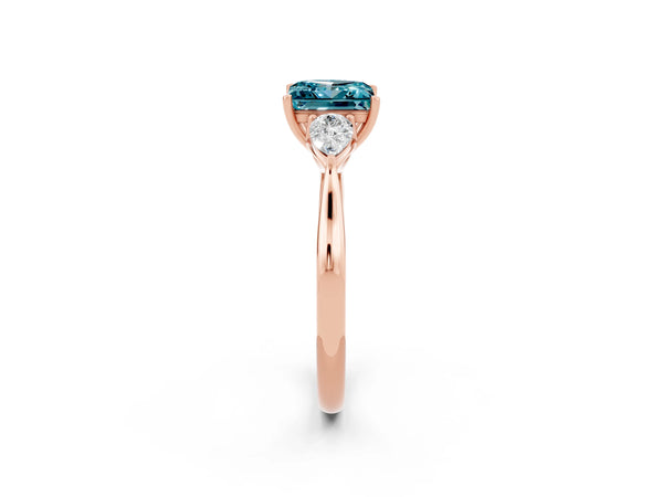 Rose gold Princess Cut Blue Topaz Three-Stone Ring with Pear  Side Stones and Prong Setting