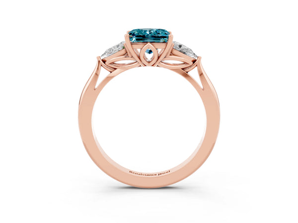 Rose gold Princess Cut Blue Topaz Three-Stone Ring with Pear  Side Stones and Prong Setting