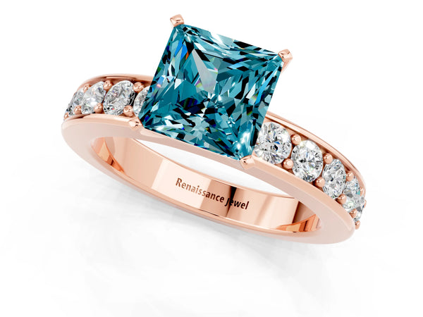 Rose gold Princess Cut Blue Topaz Engagement Ring with Channel Set Round  Band and Prong Setting
