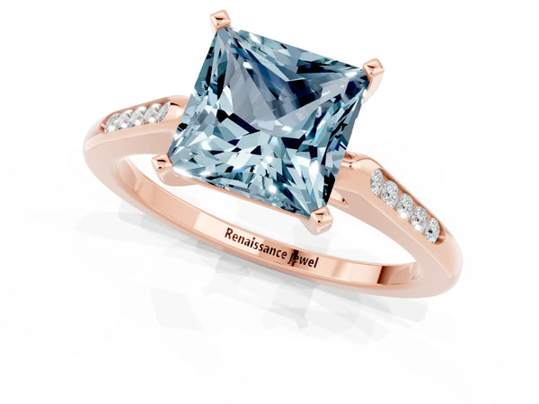 Rose gold Princess Cut Aquamarine Solitaire Ring with Channel Set Round Band and Prong Setting