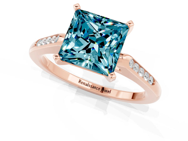 Rose gold Princess Cut Blue Topaz Solitaire Ring with Channel Set Round Band and Prong Setting