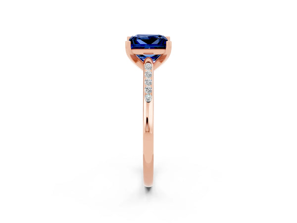 Rose gold Princess Cut Blue Sapphire Solitaire Ring with Channel Set Round Band and Prong Setting