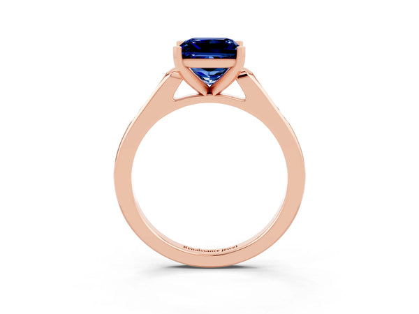 Rose gold Princess Cut Blue Sapphire Solitaire Ring with Channel Set Round Band and Prong Setting