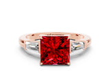 Rose gold Princess Cut Cut Diamond Ring with Tapered Baguette Side Stones in Four-Prong Setting