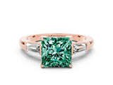 Rose gold Princess Cut Cut Diamond Ring with Tapered Baguette Side Stones in Four-Prong Setting