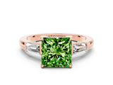Rose gold Princess Cut Cut Diamond Ring with Tapered Baguette Side Stones in Four-Prong Setting