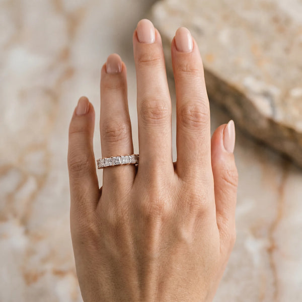 Rose gold Princess Cut Diamond Channel-Set Eternity Band with Prong Setting