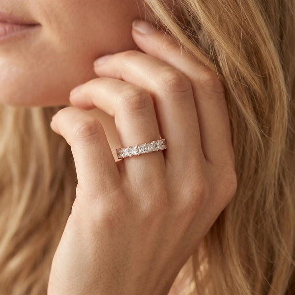 Rose gold Princess Cut Diamond Eternity Band with Channel Setting and Shared Prong
