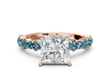 Rose gold Princess Cut Diamond Side Stone Solitaire Ring with Round with Blue Topaz side stone and Four-Prong Setting