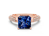 Rose gold Princess Cut Diamond Solitaire Engagement Ring with Pavé Band and Four-Prong Setting