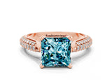 Rose gold Princess Cut Diamond Solitaire Engagement Ring with Pavé Band and Four-Prong Setting