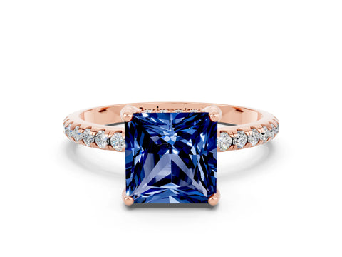 Rose gold Princess Cut Diamond Solitaire Ring with Four-Prong Setting and Pavé Band