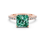 Rose gold Princess Cut Diamond Solitaire Ring with Four-Prong Setting and Pavé Band