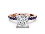 Rose gold Princess Cut Diamond Solitaire Ring with Round with Blue Sapphire side stone Pavé Band and Four-Prong Setting_36