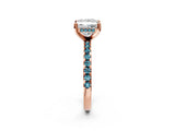 Rose gold Princess Cut Diamond Solitaire Ring with Round with Blue Topaz side stone Pavé Band and Four-Prong Setting_38