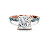 Rose gold Princess Cut Diamond Solitaire Ring with Round with Blue Topaz side stone Pavé Band and Prong Setting_12