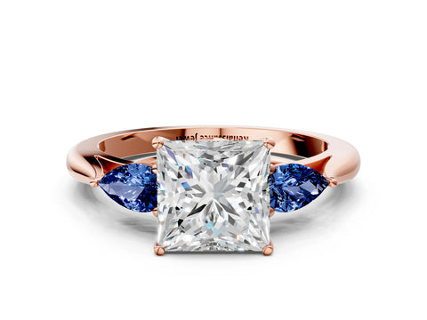Rose gold Princess Cut Diamond Three-Stone Ring with Pear with Blue Sapphire side stone Side Stones and Prong Setting