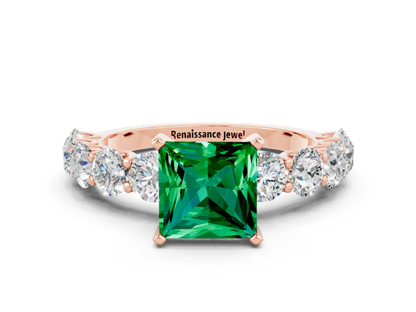 Rose gold Princess Cut Emerald Prong Setting with Side Stones on a Pave Band