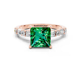 Rose gold Princess Cut Emerald Solitaire with Side Baguettes and Channel Set Band