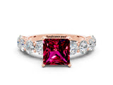 Rose gold Princess Cut Garnet Prong Setting with Side Stones on a Pave Band