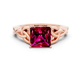Rose gold Princess Cut Garnet Solitaire Engagement Ring with Celtic Knot Band and Four-Prong Setting