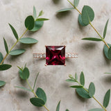 Rose gold Princess Cut Garnet Solitaire Ring with Round  Pavé Band and Four-Prong Setting_45