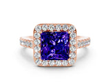 Rose gold Princess Cut Halo Diamond Ring with Pavé Band and Three-Prong Setting