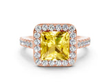 Rose gold Princess Cut Halo Diamond Ring with Pavé Band and Three-Prong Setting
