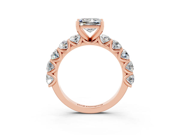 Rose gold Princess Cut Moissanite Prong Setting with Side Stones on a Pave Band