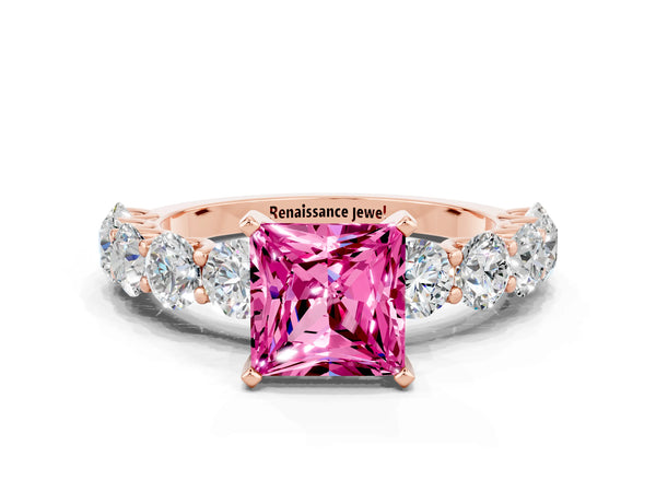 Rose gold Princess Cut Pink Sapphire Prong Setting with Side Stones on a Pave Band
