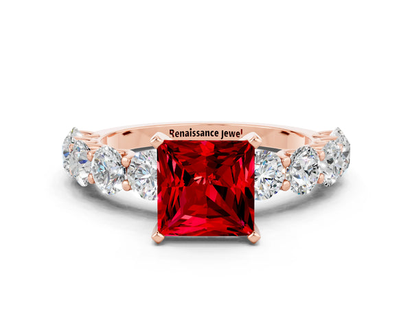 Rose gold Princess Cut Ruby Prong Setting with Side Stones on a Pave Band