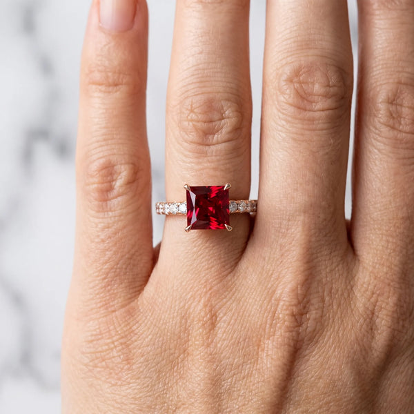 Rose gold Princess Cut Ruby Solitaire Ring with Round  Pavé Band and Four-Prong Setting
