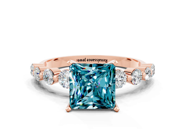 Rose gold Princess Cut Solitaire Blue Topaz Ring with Pave Band and Four-Prong Setting
