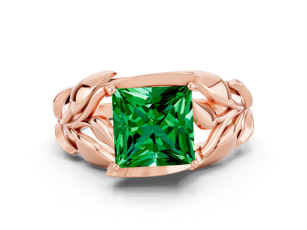Rose gold Princess Cut Emerald Leaf-Inspired Engagement Ring with Round Accents and Prong Setting