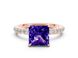 Rose gold Princess Cut Tanzanite Solitaire Engagement Ring with Pavé Band and Four-Prong Setting