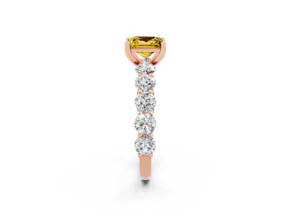 Rose gold Princess Cut Yellow Sapphire Prong Setting with Side Stones on a Pave Band