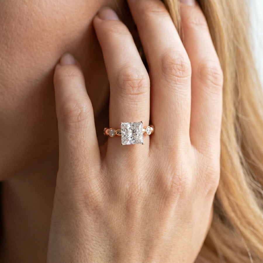 Rose gold Princess Solitaire Bezel-Set Diamond Ring with Beaded Band and Four-Prong Setting