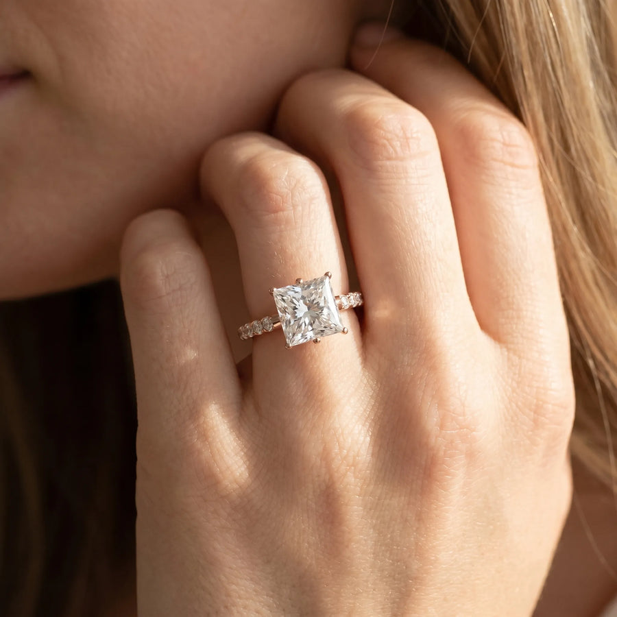 Rose gold Princess Solitaire Diamond Engagement Ring with Pavé Band and Six-Prong Setting