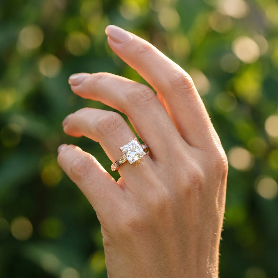 Rose gold Princess Solitaire Diamond Ring with Channel-Set Baguette Band and Four-Prong Setting
