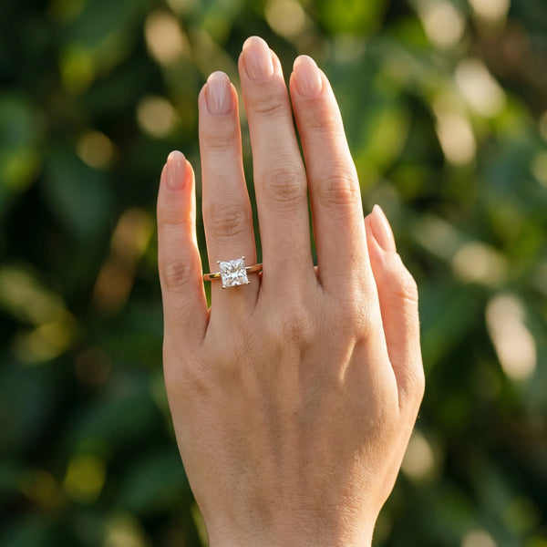 Rose gold Princess Solitaire Diamond Ring with Four-Prong Setting and Classic Band