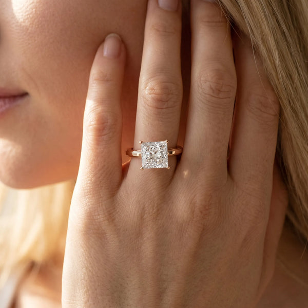 Rose gold Princess Solitaire Diamond Ring with Four-Prong Setting and Classic Band