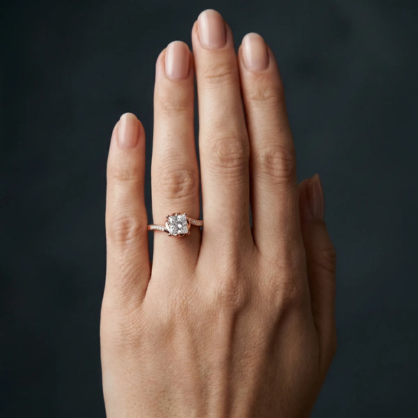 Rose gold Princess Solitaire Twist Band with Channel-Set Diamonds and Four-Prong Setting