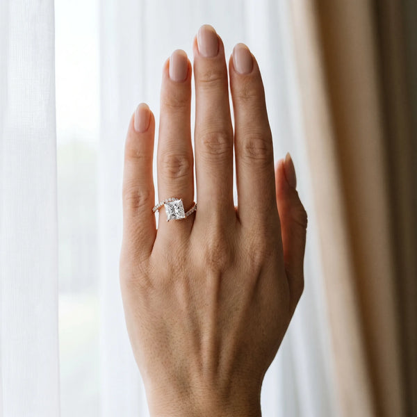 Rose gold Princess Solitaire Twist Band with Pave Set Diamonds and Four-Prong Setting