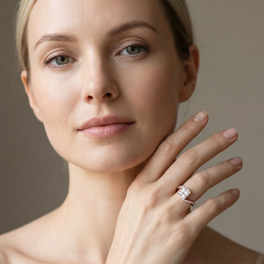 Rose gold Princess Solitaire Twist Band with Pave Set Diamonds and Four-Prong Setting