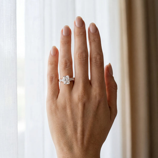 Rose gold Radiant Brilliant Diamond Five-Stone Engagement Ring with Prong Setting on a Classic Band