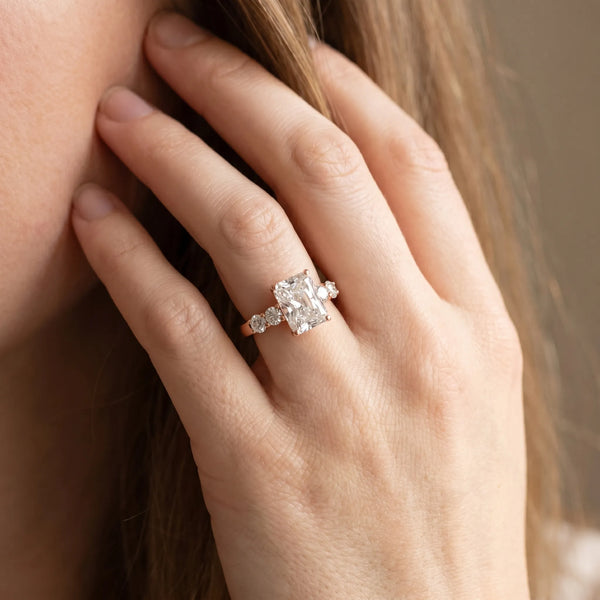 Rose gold Radiant Brilliant Diamond Five-Stone Engagement Ring with Prong Setting on a Classic Band